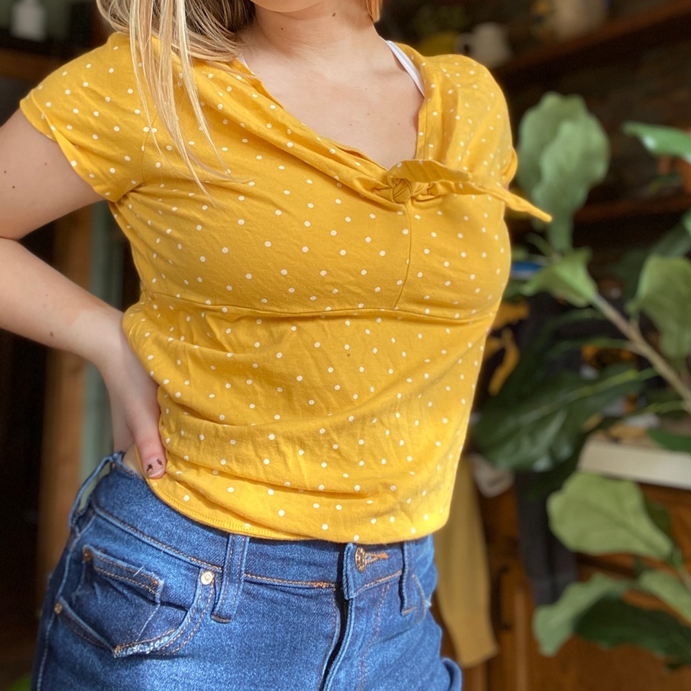 Yellow polka dot tied shirt